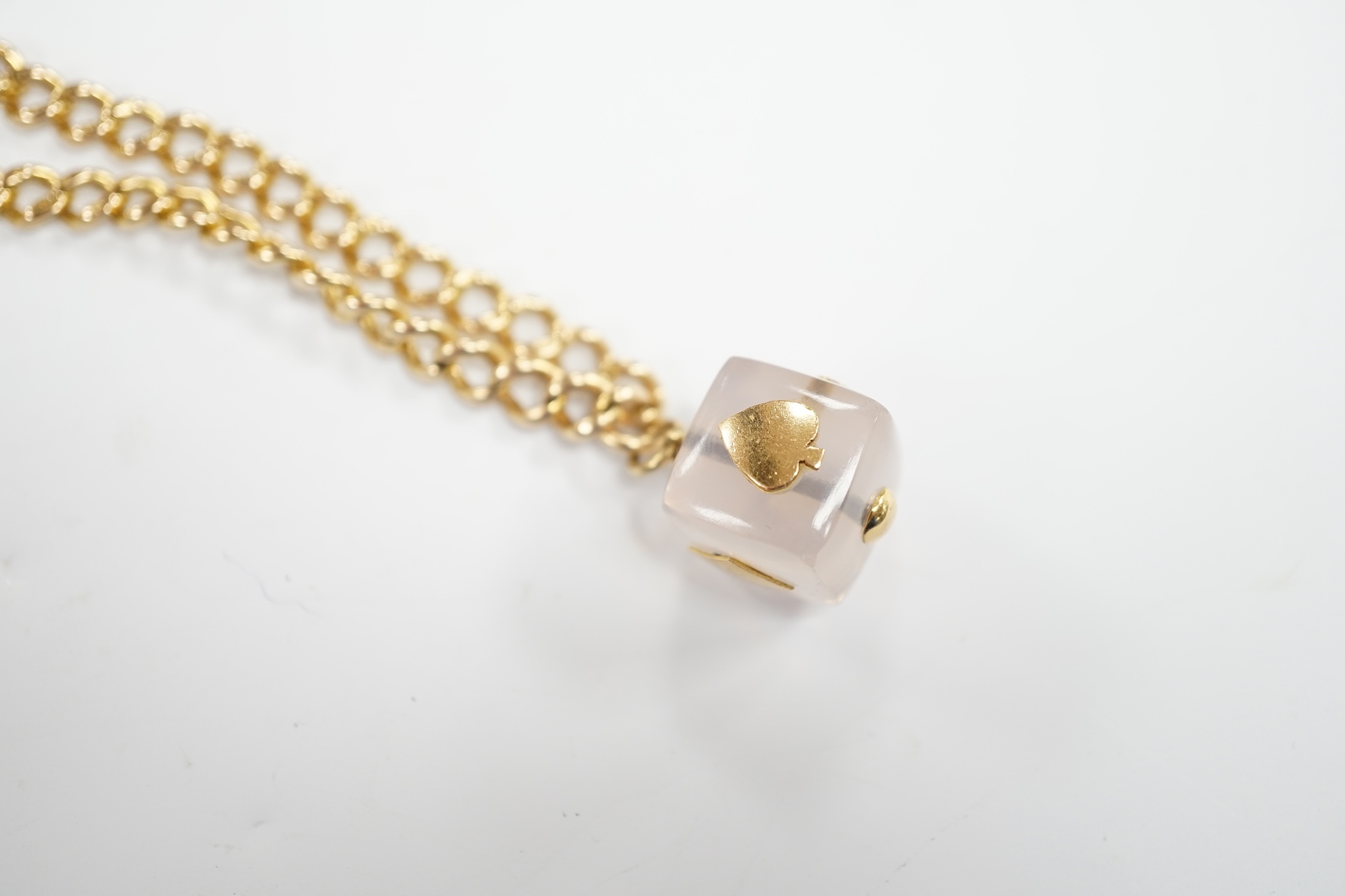 An Edwardian 15ct gold curb link bracelet, 16cm, hung with a later mounted glass cube charm, gross weight 20.8 grams.